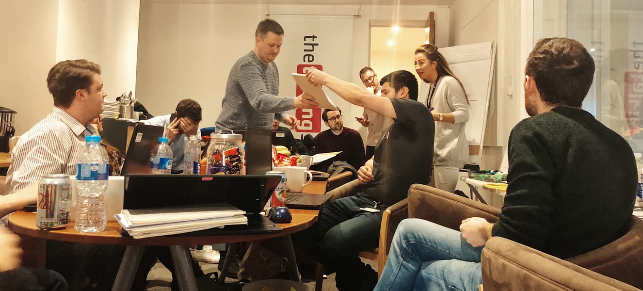 CarFinance 247 team talking after a user experience testing session