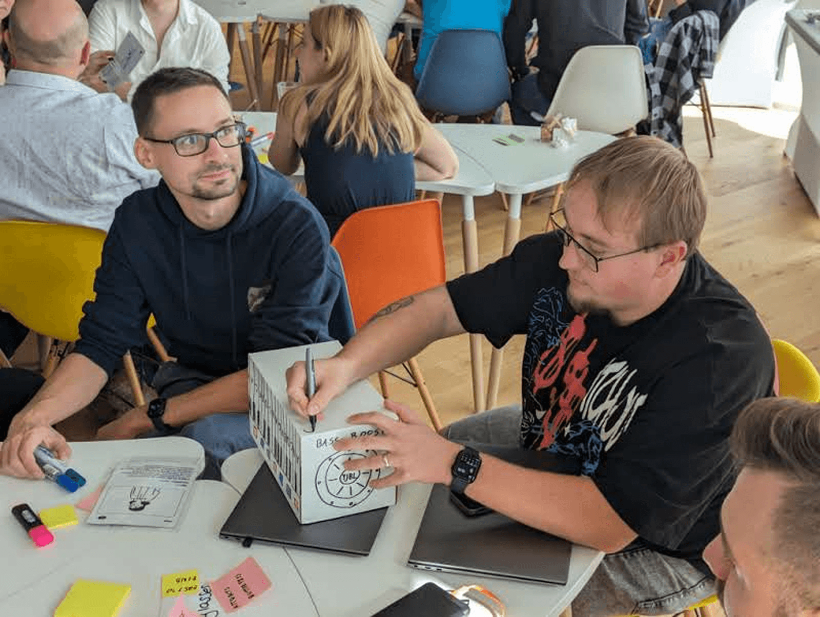 Workshop participants designing a cardboard radio